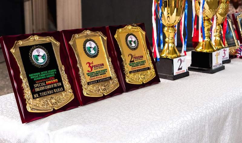 Award plaques and trophies on a table